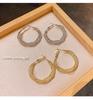 Niche Design Sense Winding Metal Earrings Female Korea Dongdaemun Personality European and American Style Ins Earrings