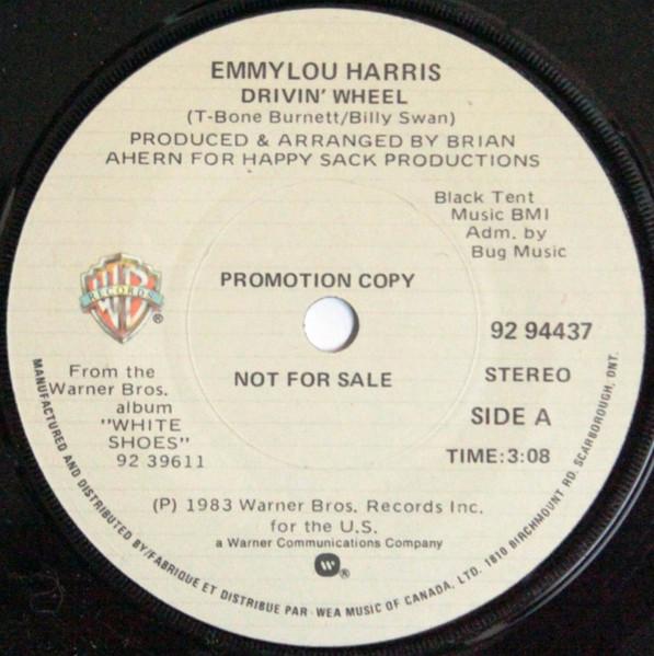

7-дюймовая пластинка EMMYLOU HARRIS Drivin Wheel Good News 9294437 Warner Bros. Канада 1983 года СтранаНародный Использованный