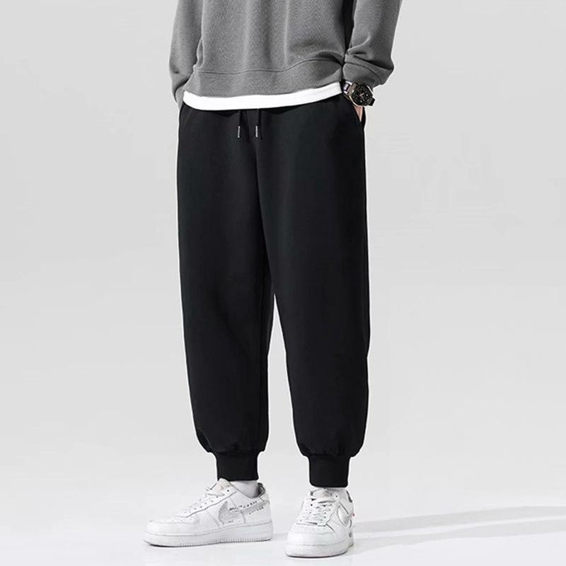 Casual sweatpants men's autumn and winter new large size tied feet thickened trendy printed velvet pants