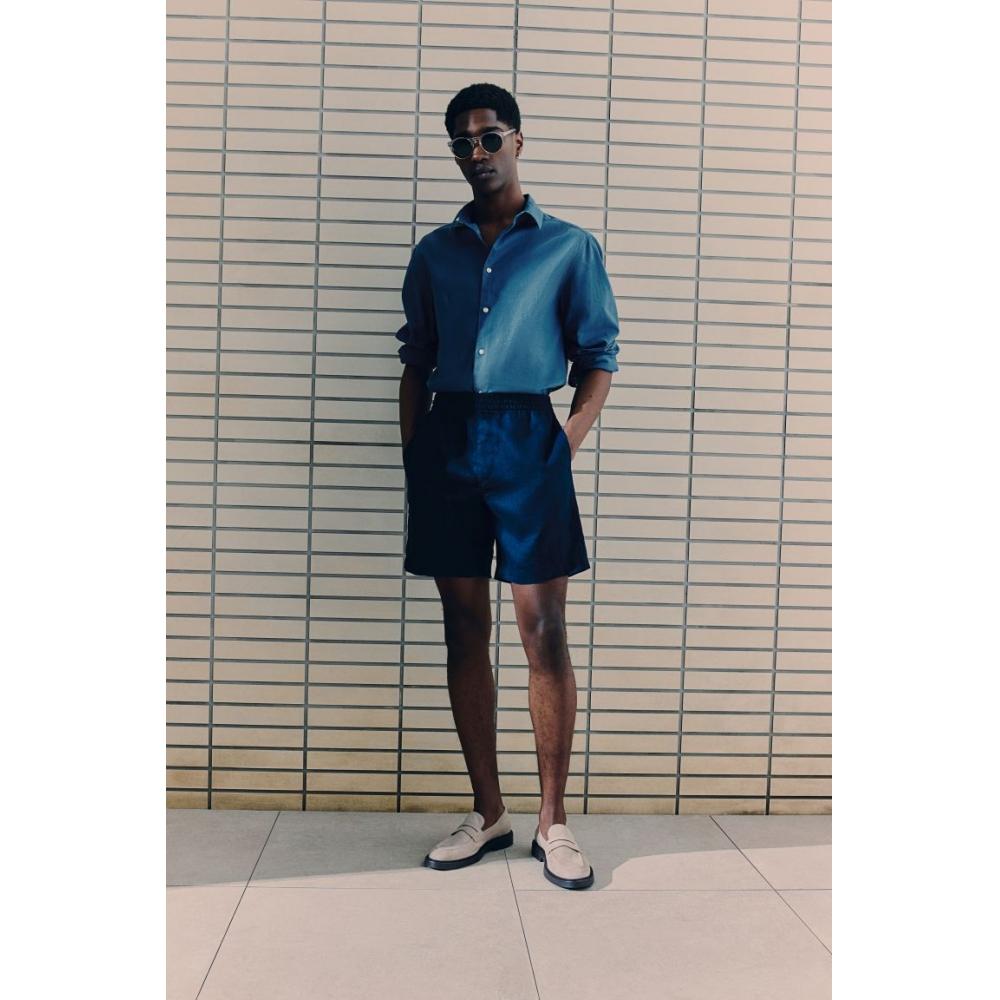 

Рубашка из смесового льна HM Regular кроя темно-синего цвета