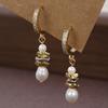 2024 New Chinese Imitation Pearl Earrings: Elegant Small Batch Design, High-End Ancient Style Ear Ornaments for Women