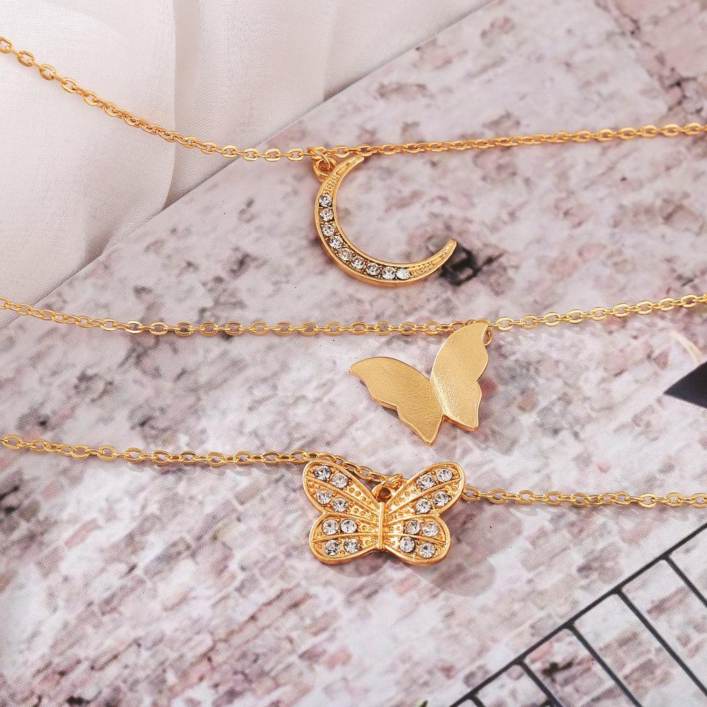 European & American Inlaid Rhinestone Butterfly Pendant Necklace: Women's Creative Simple Alloy Three-Layer Design.