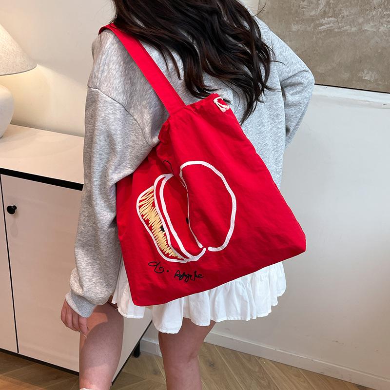 Summer drawstring nylon shoulder bag women's versatile red and white contrasting apple slices portable tote bag