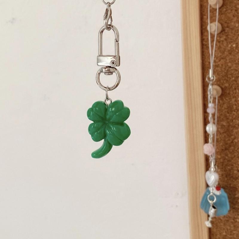 Grünes vierblättriges Kleeblatt Handy-Anhänger-Riemen Auto-Schlüsselanhänger Anhänger Mode-Taschen-Dekoration Lanyard Geldbörsen-Zubehör