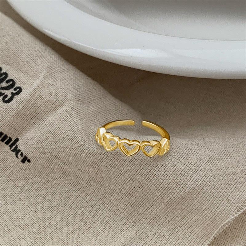 

Сплайсинг Кільце з порожнім серцем Жіночий Дизайн з почуттям темпераменту Просте Нерегулярне кільце-серце Сотні Ручних ювелірних виробів Елегантні Прості Жіночі кільця