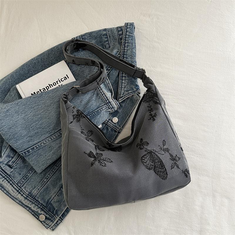 

Embroidered thread butterfly casual bag women s 2025 summer new large-capacity personalized underarm bag popular contrasting color shoulder bag
