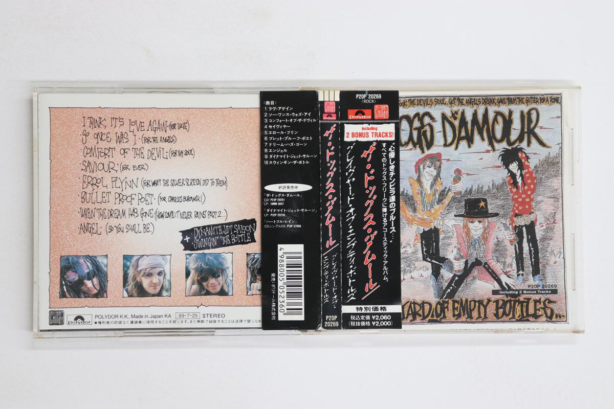 

CD DOGS D AMOUR - Graveyard of Empty Bottles P20P20269 CHINA 1991 China Obi Rock Used