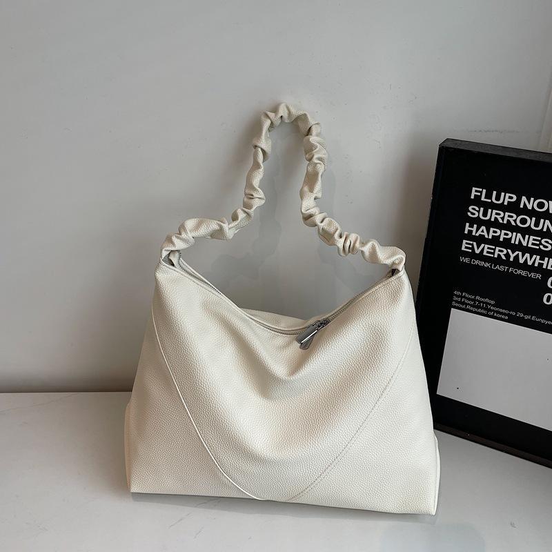 

Large capacity bag women s new autumn and winter retro niche texture dumpling commuting versatile shoulder bag