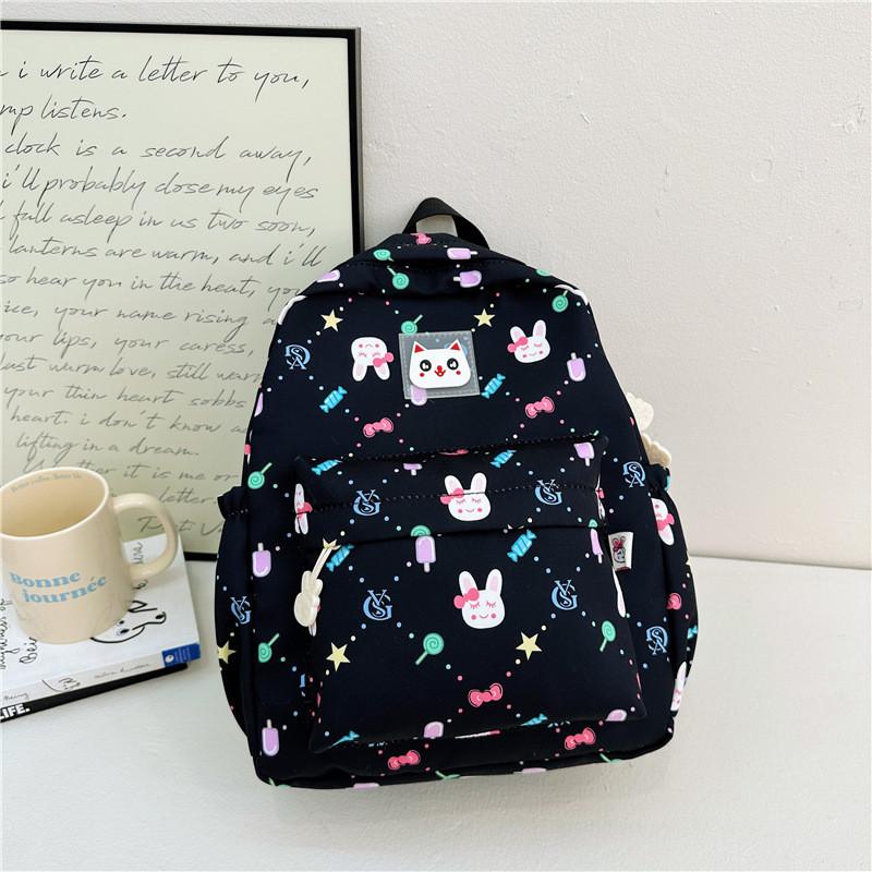 

Cute Cartoon Children s Backpack Stylish Nylon Preschool Bag For Kids With Comfort Straps In Purple Black Green Pink Blue чёрный
