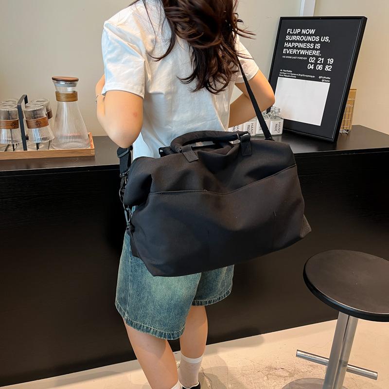Going out travel bag simple niche lightweight handbag bag new large-capacity storage luggage bag shoulder messenger bag