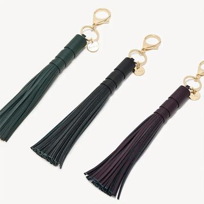 BRELOQUE POMPON EN CUIR
