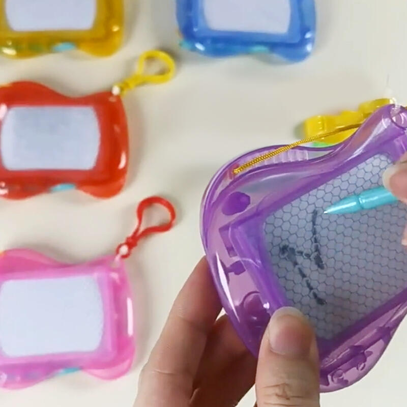 Drawing board keychain useless unique gift useless smile pink