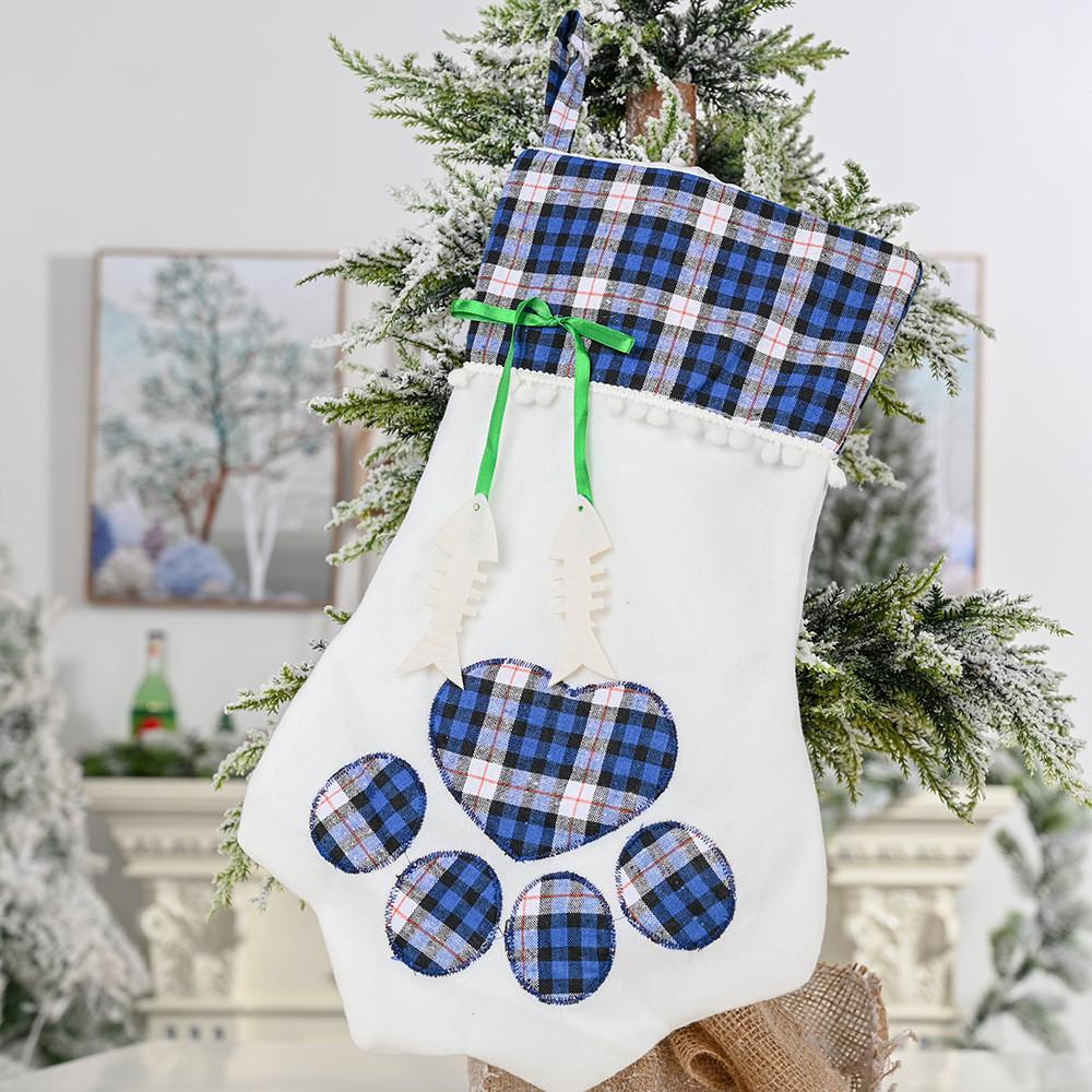 

Fabric Adorable New Paw Print Christmas Stocking For Dogs And Cats In Red Blue And