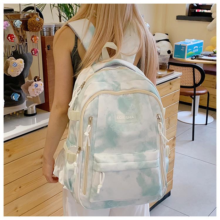 School bag personality trend tie-dye backpack men and women college students school bag fashion junior high school students backpack large capacity