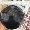 Black Stone Round Glass Ball Sculpture with Inlaid Eyes - No-Hole Design for Display and Decoration