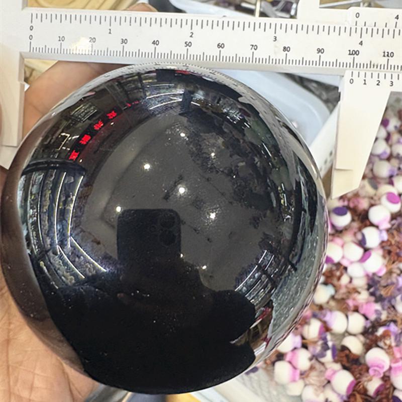 Black Stone Round Glass Ball Sculpture with Inlaid Eyes - No-Hole Design for Display and Decoration