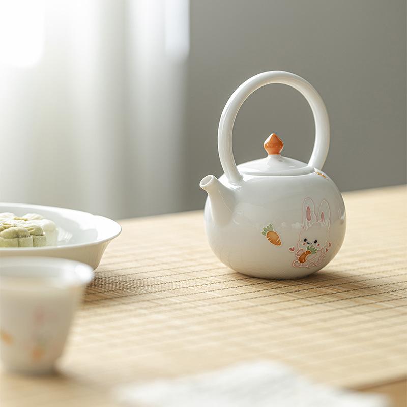 Japonská ručně malovaná konvice na čaj Moe Rabbit, zvedací hrnec, domácí bílá porcelánová bublinková konvice na čaj s kuličkovým otvorem, filtr, kung-fu čajová sada