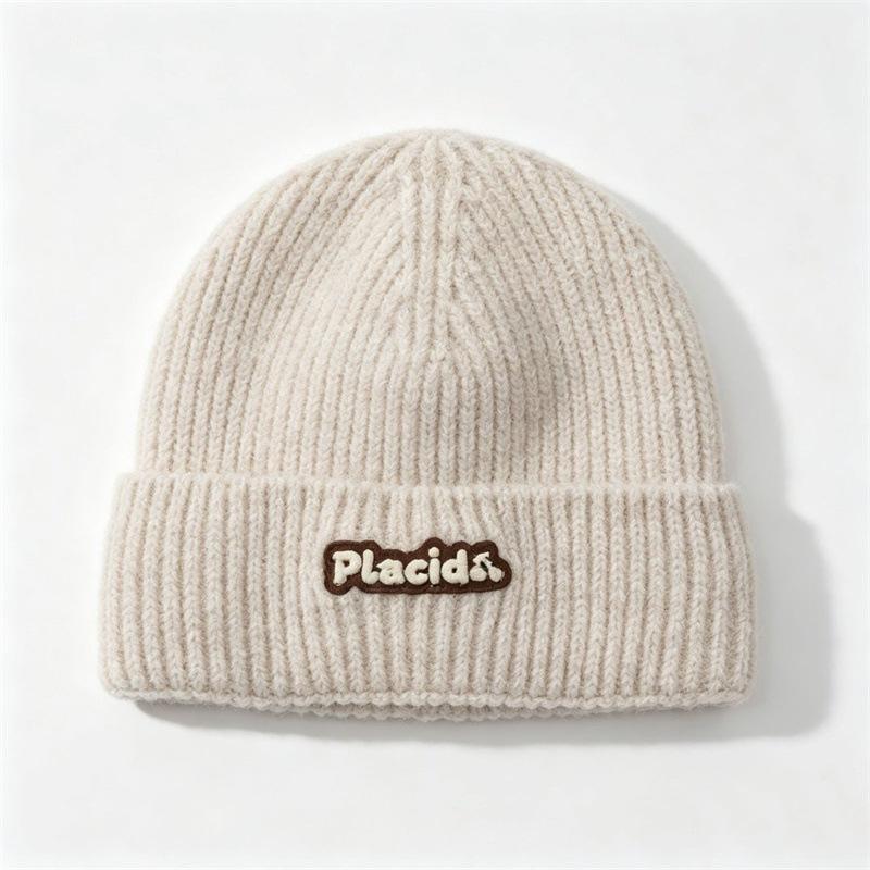 Knitted hat women's autumn and winter letter wool hat outdoor warm versatile pullover ear protector cold hat men's tide