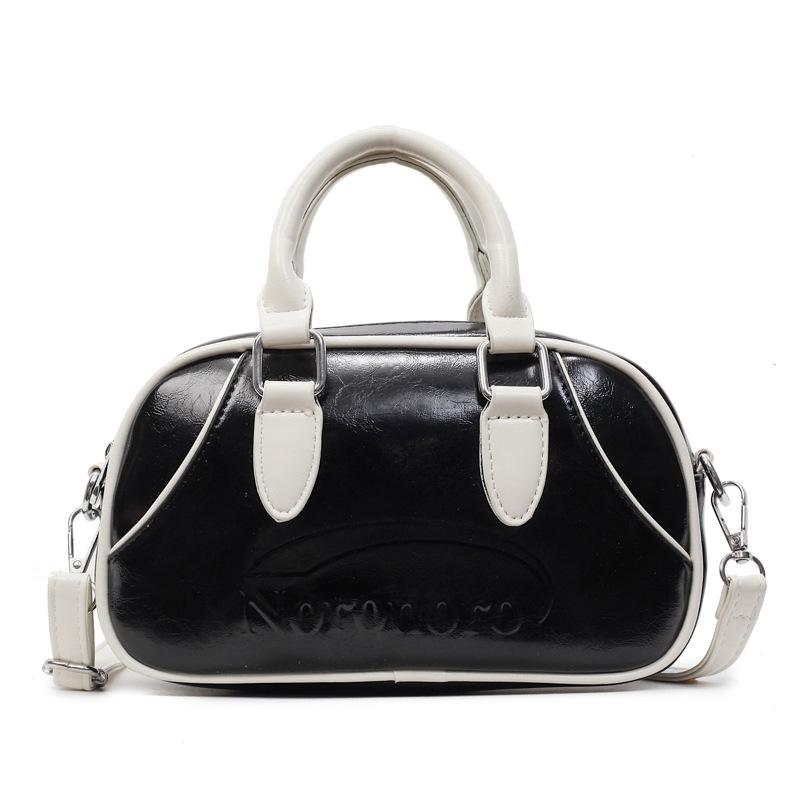 2025 new Korean simple contrasting color portable Boston bag casual commuting versatile foreign style niche messenger women's bag
