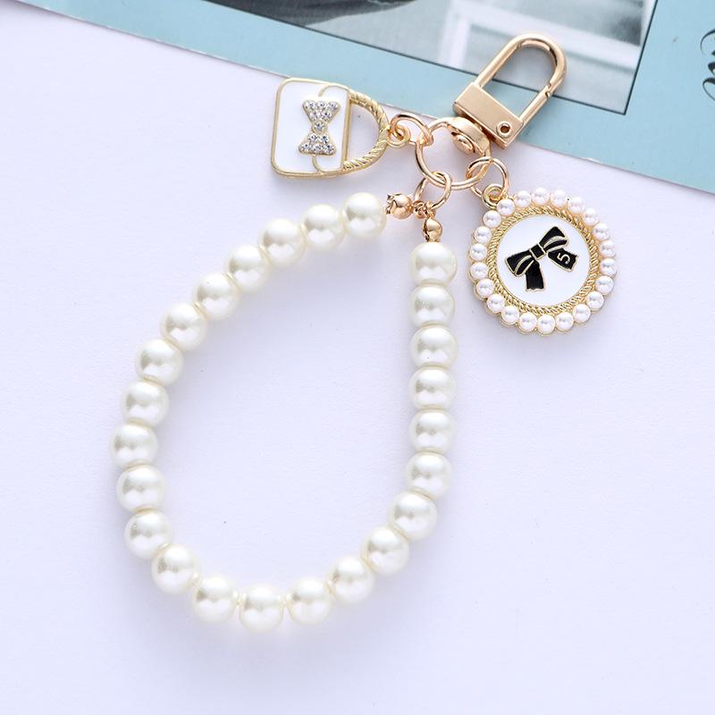 Pearl French-Style Alloy Keychain with Bow Tie Pendant