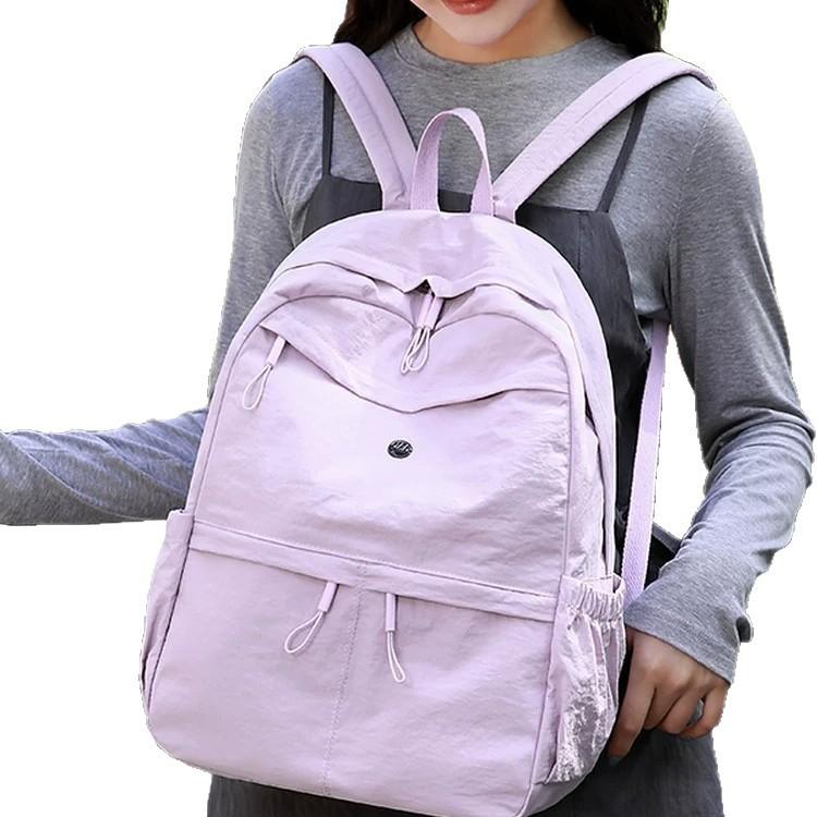 Schoolbag backpack women's new Korean version of fashion college student schoolbag commuting simple leisure large capacity travel bag