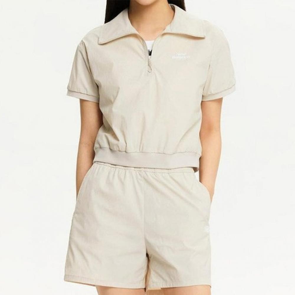 

Футболка New Balance Frozen Woven sTreTch Collar на молнии до половины Полуоверсайз Nbnfe3w 085(S)