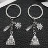 Ancient Silver Castle Sun Statue Zinc Alloy Keychain - Creative Backpack Accessory and Commemorative Pendant.