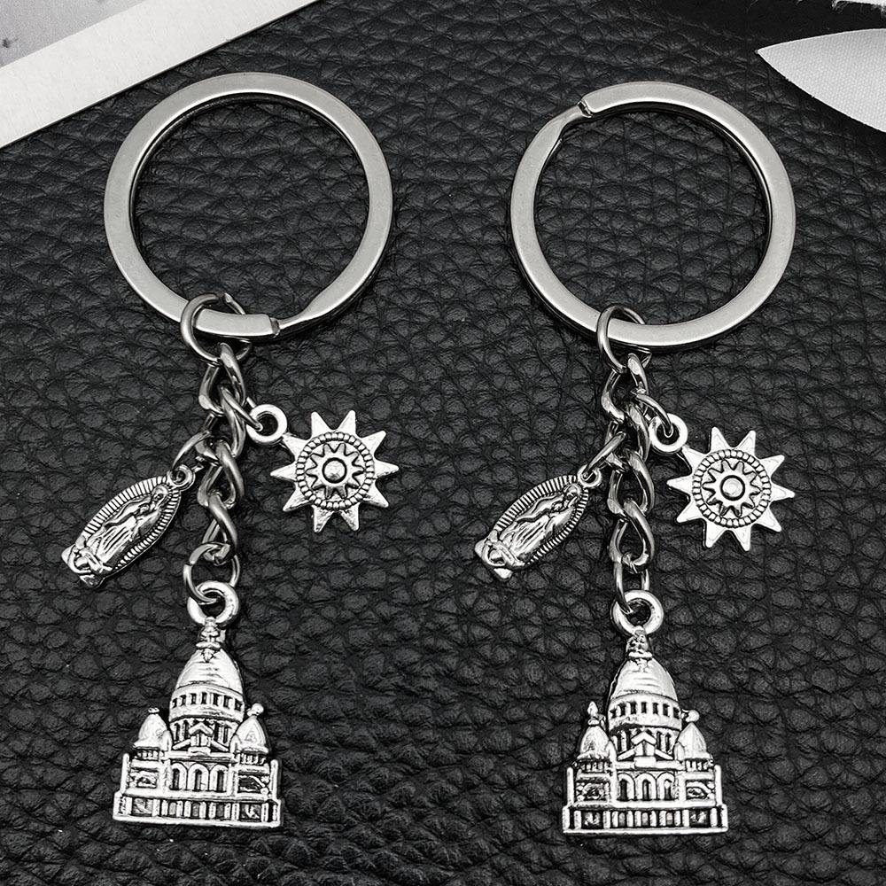 Ancient Silver Castle Sun Statue Zinc Alloy Keychain - Creative Backpack Accessory and Commemorative Pendant.
