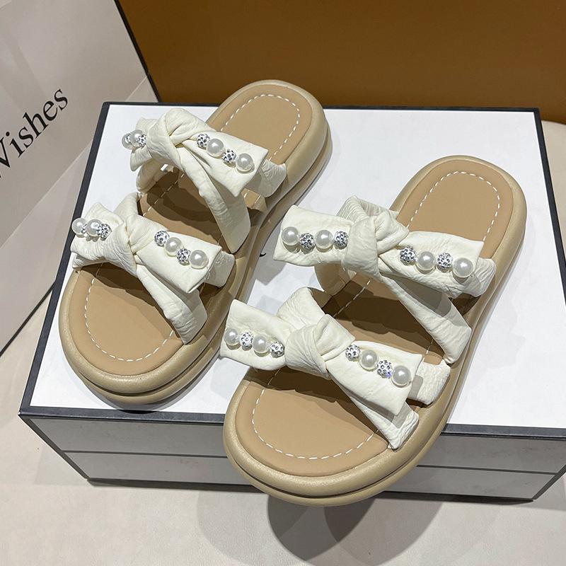 thick-soled pearl slippers for women to wear in the summer of 2025, the new fairy style fashion bow muffin open-toed sandals