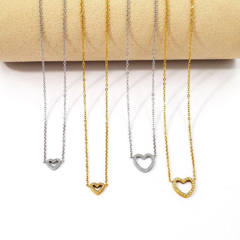 European Diamond-Accented Heart Jewelry Set: Necklace, Bracelet & Earrings in Titanium Steel for Women's Luxurious Style.