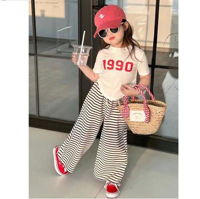T-shirt d'été élégant et irrégulier à manches courtes pour filles avec pantalon rayé à jambes larges, ensemble complet de style coréen pour l'été pour filles