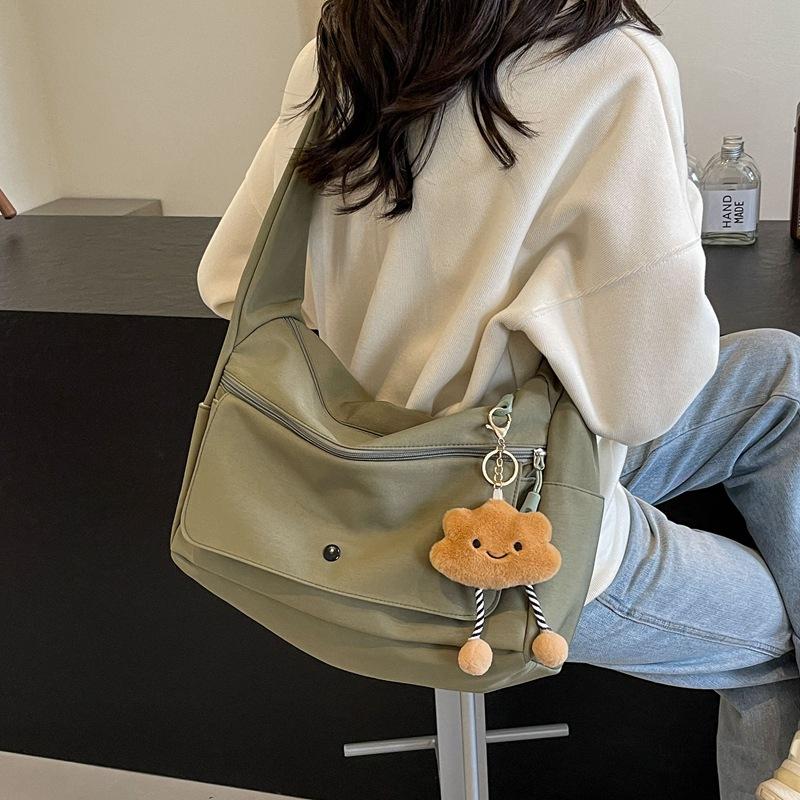 Tooling messenger bag women's 2025 new shoulder bag Hong Kong style large capacity trend leisure bag tide student class backpack