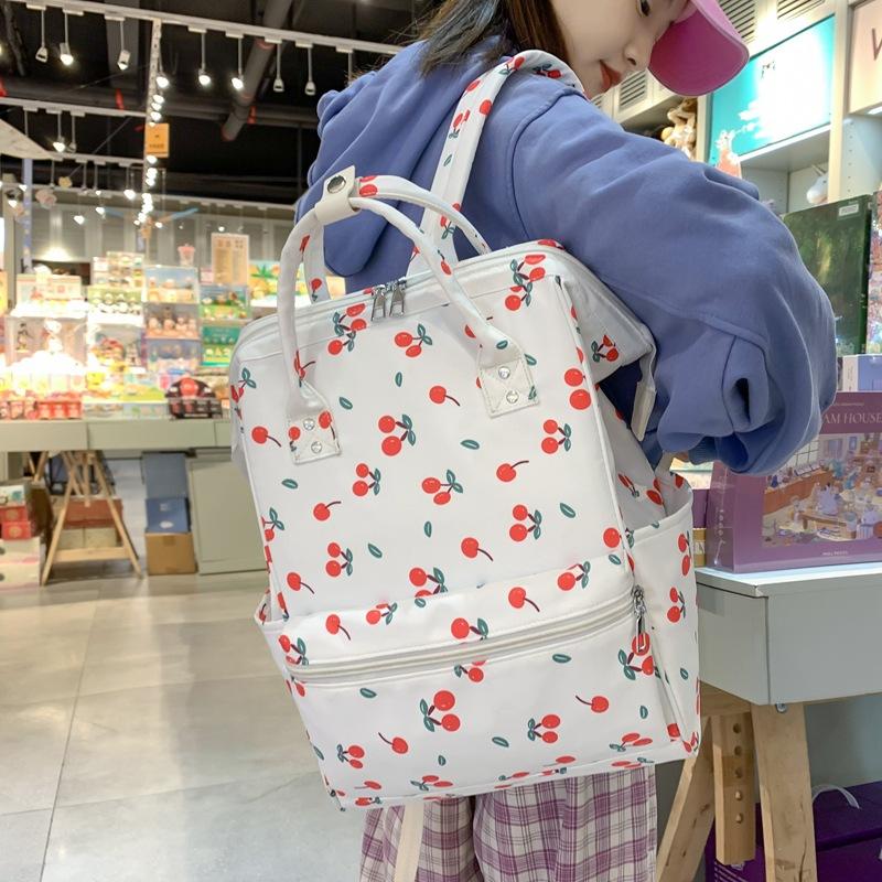 School bag female ins style Korean girl junior high school student middle school student literary small fresh floral backpack clip backpack