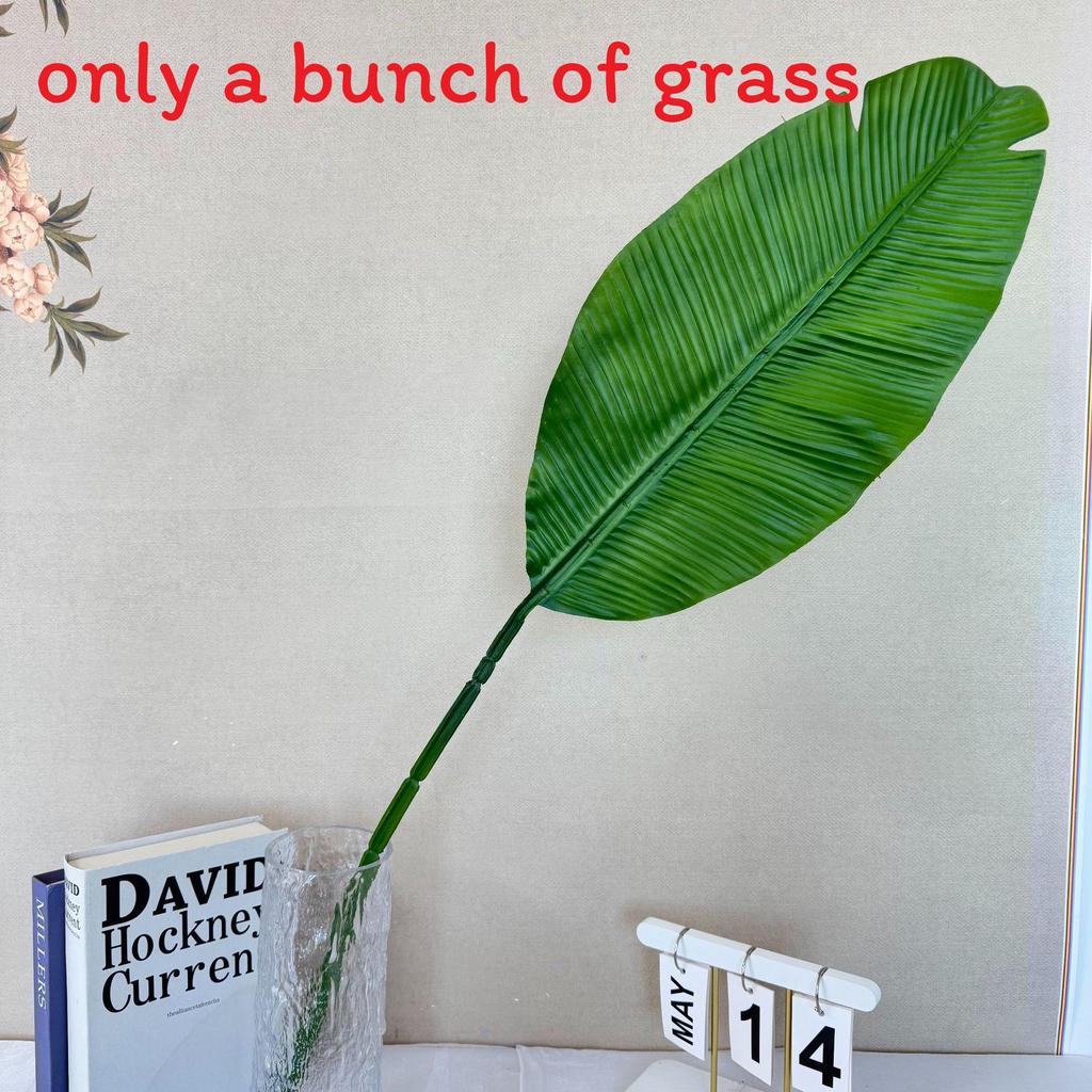 Dekoration i form av en falsk bananbladsfläkt för bröllop och heminredning