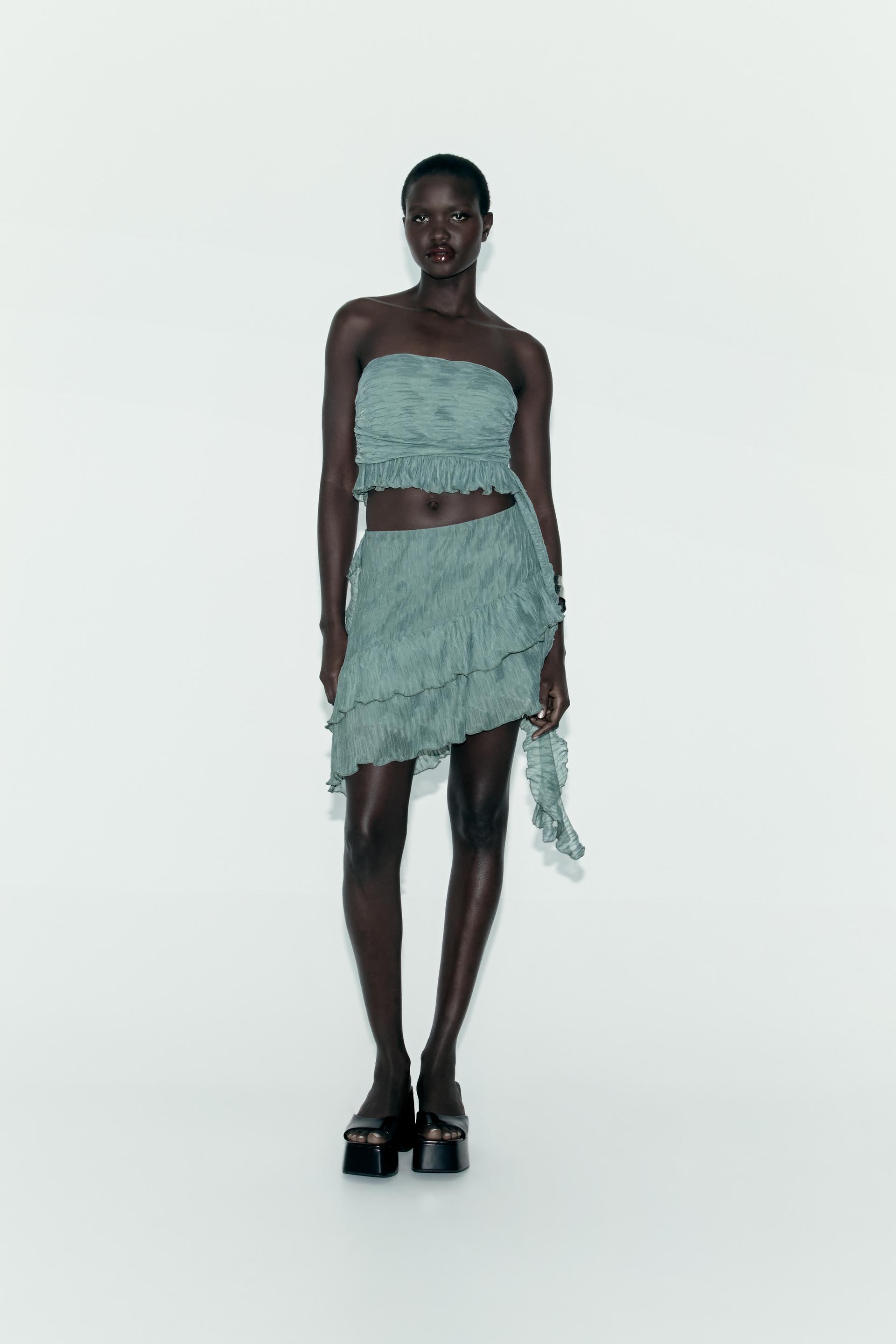 

PLEATED SKIRT WITH RUFFLES