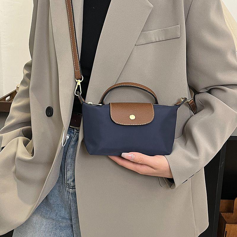 Elegant Lightweight Crossbody Handbag: Versatile Women's Commuter Bag with Phone and Coin Pockets