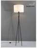 Nordic Modern Three-Legged Floor Lamp - Elegant Minimalist Lighting for Living Room, Bedroom, or Homestay.