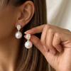 Hot-selling light luxury pearl zircon earrings women's fashion commuter versatile earrings high-end stud earrings copper