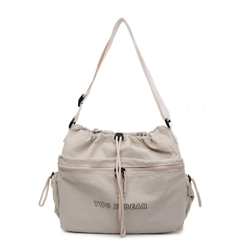Large capacity casual tote canvas bag women's light drawstring bucket bag travel bag simple commuter shoulder crossbody bag