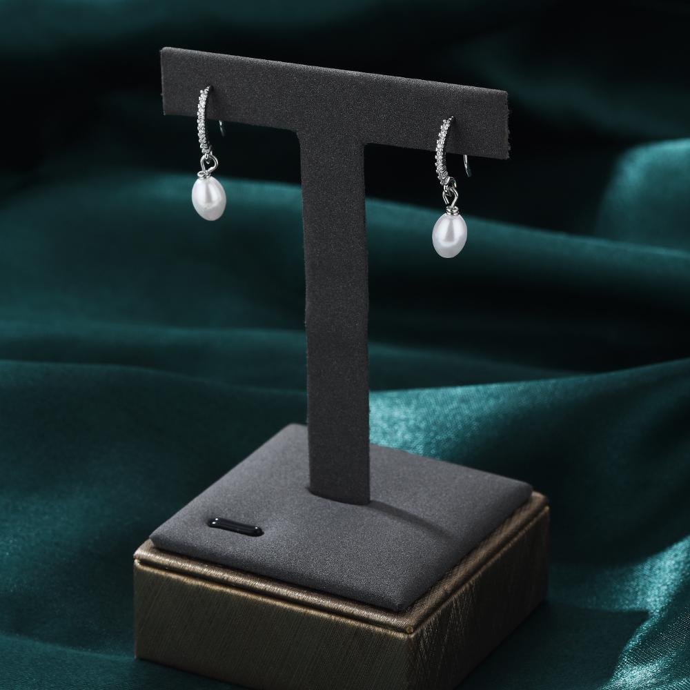 Ohrringe mit weißem Zirkonia und Perlenimitat