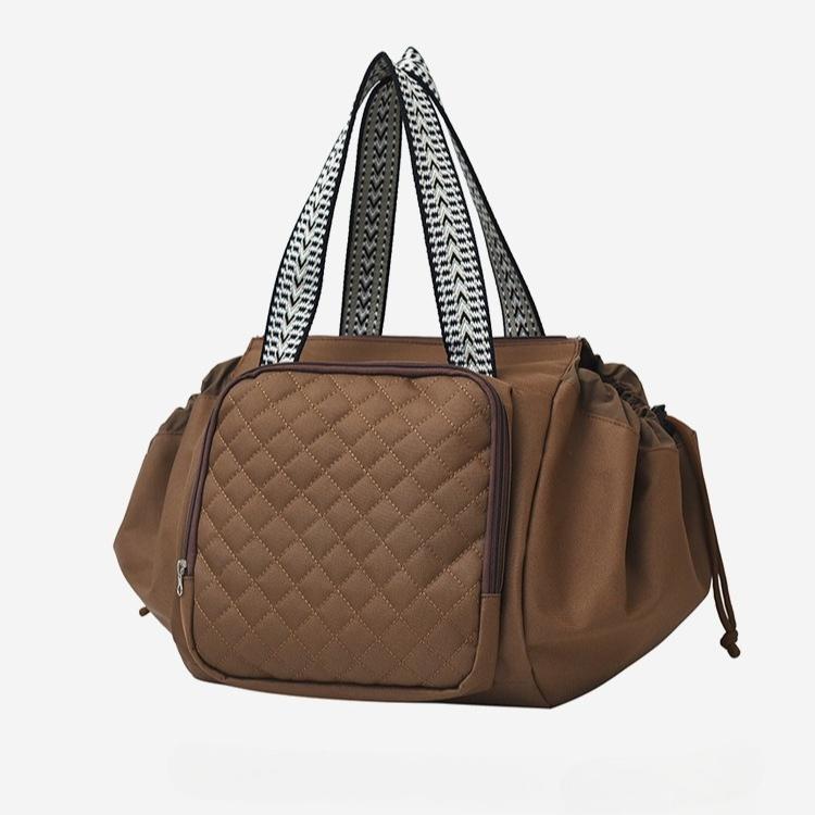 

Женские сумки большой вместимости популярны и меняются. Сумки-люльки 2025 Осень Новые Водонепроницаемые Сумки для мам Женский Универсальный Рюкзак для Отдыха и Путешествий темно-коричневого