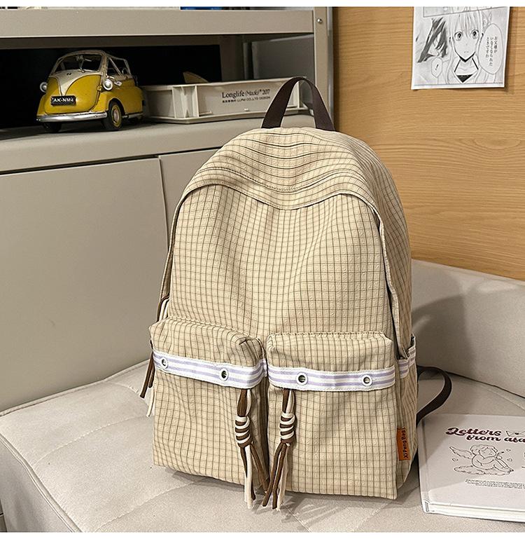 Schoolbag schoolbag junior high school girl 1011 new Japanese ins niche plaid student large capacity lightweight versatile backpack