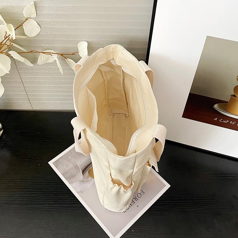 Large-capacity Versatile Bag Women's 2025 New Shoulder Canvas Portable Popular Texture Class Commuter Tote Bag Soft