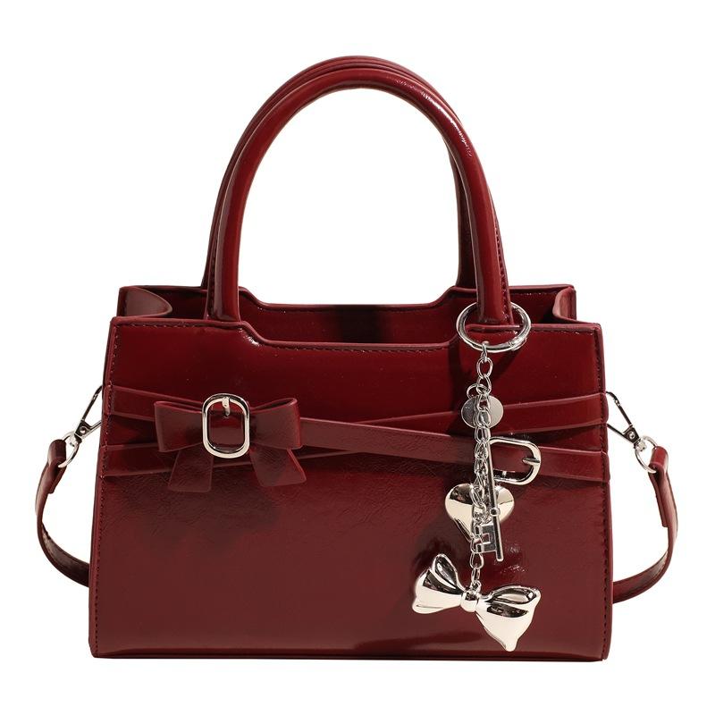 

High-end niche bag women s spring and summer new shoulder messenger bag casual women s hand bag no pendant красный