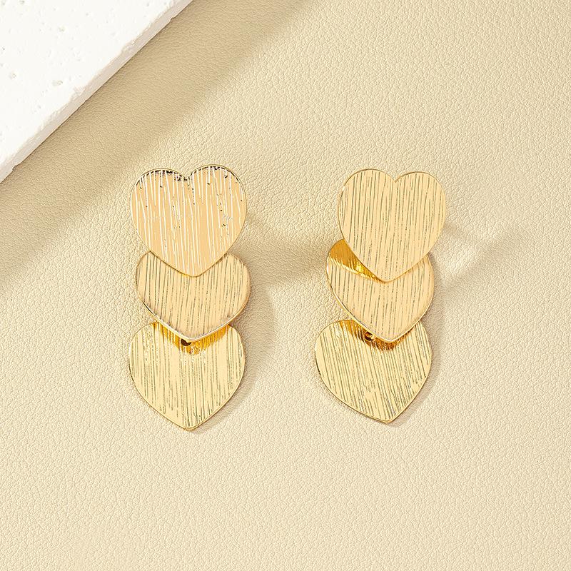 Exaggerated Punk Heart Earrings: European & American Style for Women