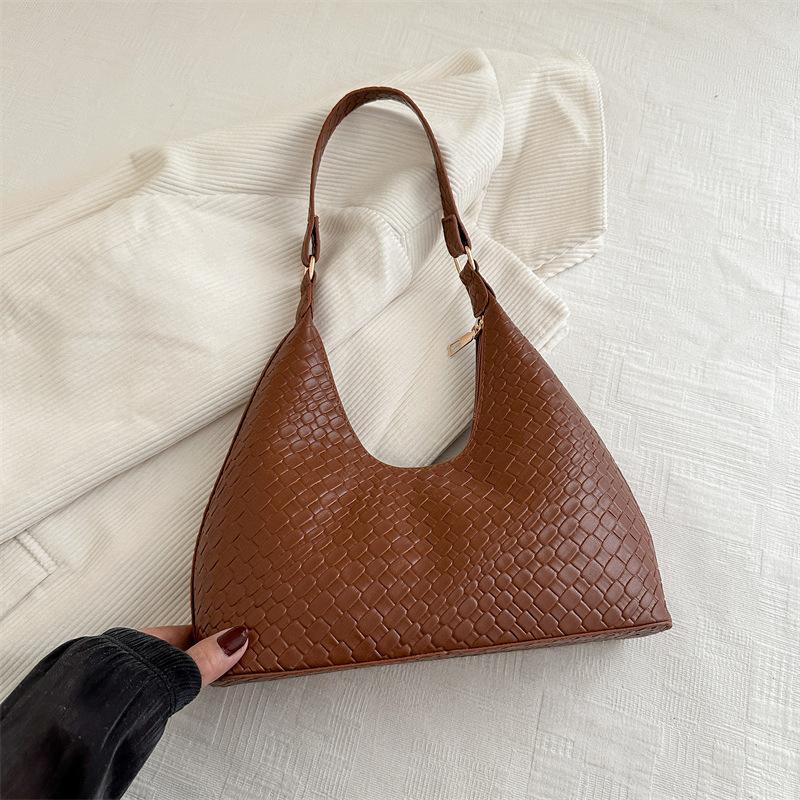 

2025 модная популярная плетеная простая сумка-тоут нишевый дизайн сумка подмышку зарубежный стиль большая вместимость сумка через плечо светло-коричневого