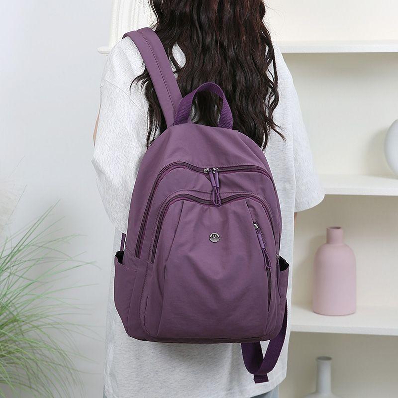 

Travel New Casual Versatile Backpack Simple and Lightweight Oxford Cloth Commuter Fashion Large Capacity School Bag Women s Backpack Height 36 Bottom width 28 Thickness 12cm фиолетовый