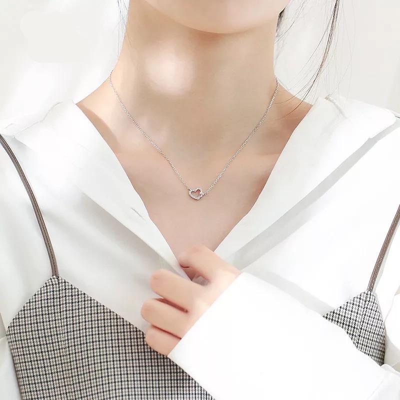 Beixi S925 Sterling Silver Heart Necklace - Cute Hollow Peach Pendant, Simple and Versatile Design.