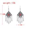 Ethnic style Kazakh earrings women's retro high-end fringed earrings Xinjiang Miao Yin exotic style festival earrings