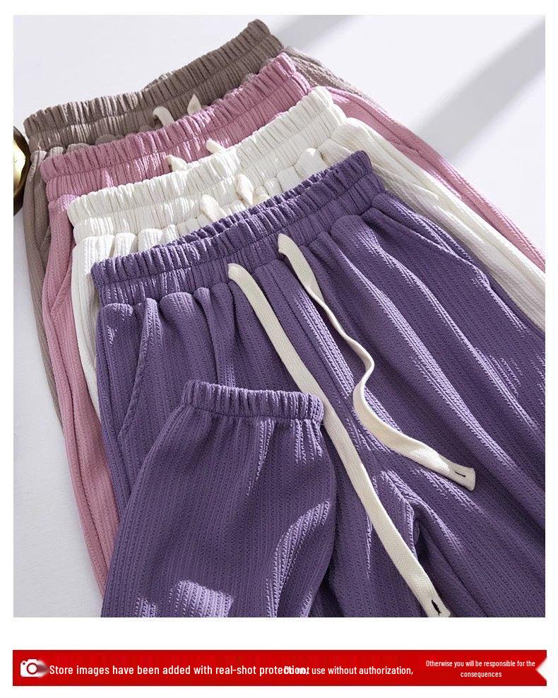 2026 Spring Slimming Joggers: Unisex Polyester Pants for Shorter Frames - Fashionable, Loose-Fit Harem Style for Spring/Autumn.